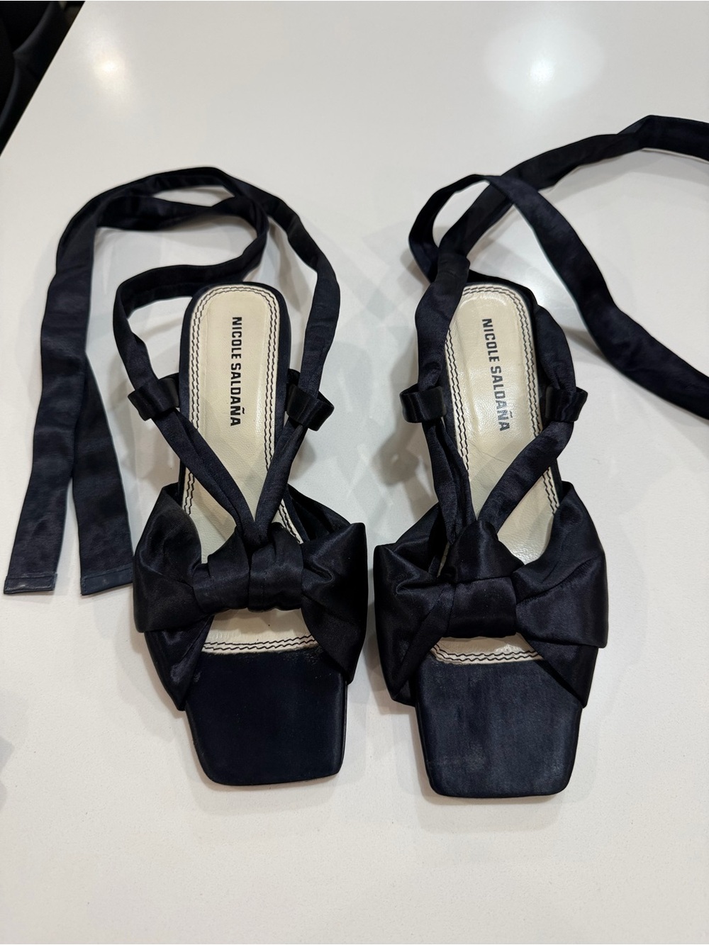 Nicole Saldaña Black Satin Bow Sculptural Chrome Heel Sandals
